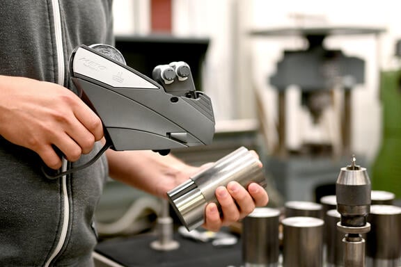Meto Industry hand labelers in use for marking production batches, inventory, and finished goods in industry