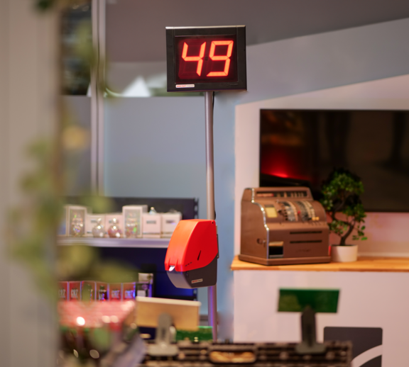 Turn-O-Matic, queue call system, customer flow management